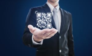 man holding qr code